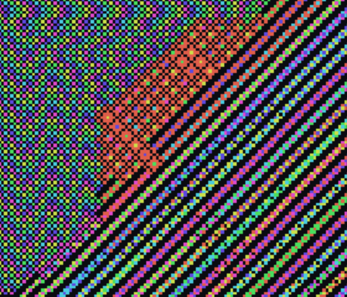 An orange blotch sitting at the seam where a cross-hatch region meets the diagonal twill.